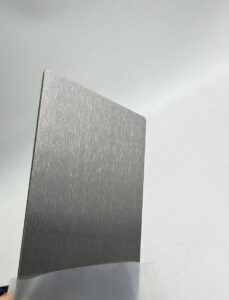 Polished finished titanium plates showcasing uniform surface conditioning and flawless texture.