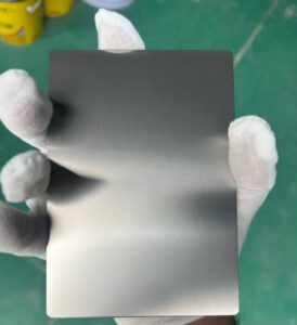 High quality precision finished titanium plates with clean edges for industrial manufacturing.